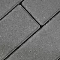 Плитка тротуарная серого цвета на сером цементе